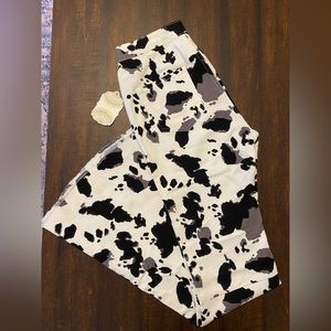 Altar’d State Bell Bottom Cow Print Jeans